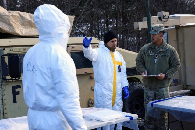 Sgt. Class Rigoberto J. Olmeda-Flecha (center) and 1st Lt. Derek Canlas R. Canlas (right)