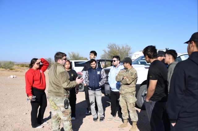 Airborne Test Force Staff Sgt. Kyle Dunwiddie (front center) coordinated the visit on Jan. 29, 2025, along with the local Army recruiter. He’s serving a second tour of duty at Yuma Proving Ground, the first from 2013 to 2018. At the time he...