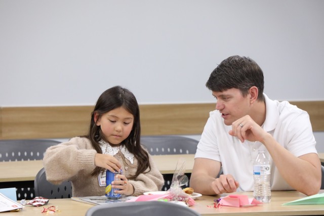 Dad bonding with daughter