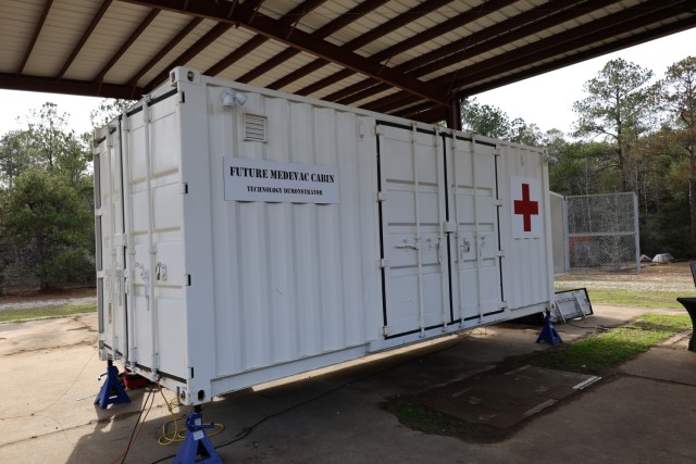 The Future Medevac Cabin Technology Demonstrator, a modified 20-foot CONNEX configured into a transportable mockup of a MEDEVAC cabin, demonstrates cabin and patient handling system designs to collect user feedback to be used in future systems on...