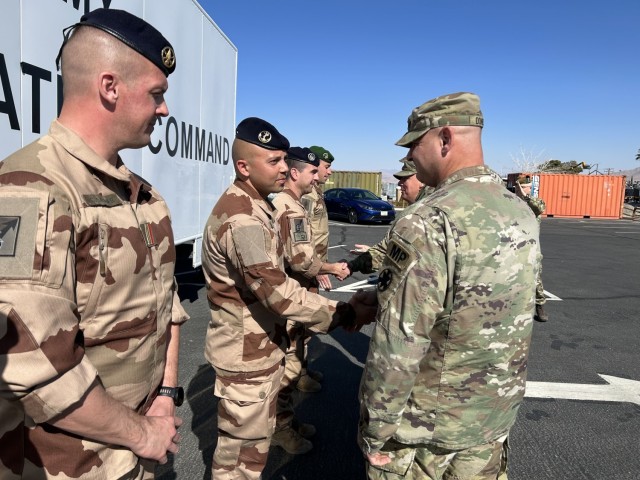 French Soldiers Coined by Fort Irwin Command Teams