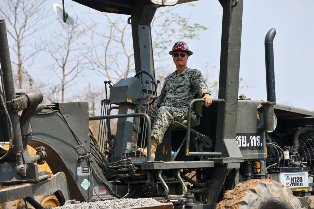 A U.S. Marine assigned to 9th Engineer Support Battalion, 3rd Marine Logistics Group, poses for a photo during Joint Exercise Cobra Gold 2025 at Ban Chan Khrem, Chanthaburi Province, Thailand, Feb. 20, 2025. Consistent face-to-face engagements...