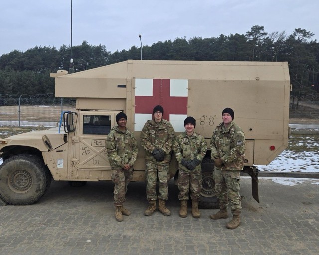 US Army Medics from the 1st Battalion, 67th Armored Regiment rendered aid to Polish allies following vehicle accident
