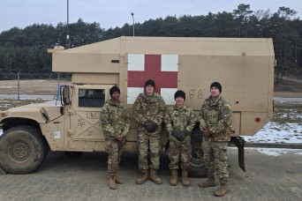US Army medical team renders aid to Polish allies following vehicle accident