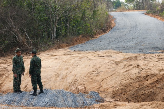 A Thai major, assigned to the Royal Thai Marine Corps, Construction Company of Combat Engineers, speaks to a first lieutenant, assigned to the Royal Thai Marine Corps, during Joint Exercise Cobra Gold 2025 at Ban Chan Khrem, Chanthaburi Province,...