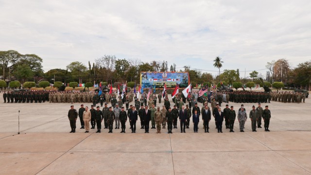 Participants in the Cobra Gold 2025 opening ceremony pose for a group photo in Camp Suranaree, Thailand, February 25, 2025. The opening ceremony marks the 44th iteration of Cobra Gold, which started in 1982 and is the largest exercise in mainland...