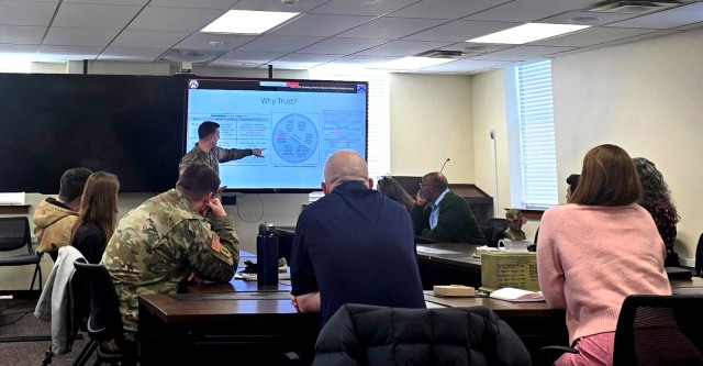 Chaplain (Lt. Col.) Jared Vineyard, Combined Arms Center deputy chaplain and Center for Army Leadership ethicist, leads a discussion on trust during leader professional development for The Research and Analysis Center Feb. 13, 2025, in the TRAC...