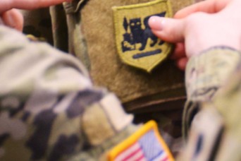 Garrison Soldiers don SETAF-AF insignia in symbolic ceremony