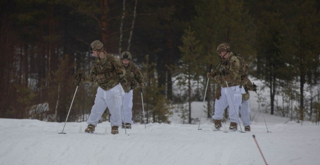 10th Mountain Division Soldiers execute movement via Finnish Skis