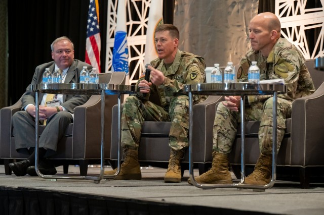 (Center) Brig. Gen. Allen Pepper, the commander of the U.S. Army Security Assistance Command (USASAC), briefs security assistance and foreign military sales during the Army Worldwide Security Assistance Conference (AWSAC) in Arlington, Virginia...