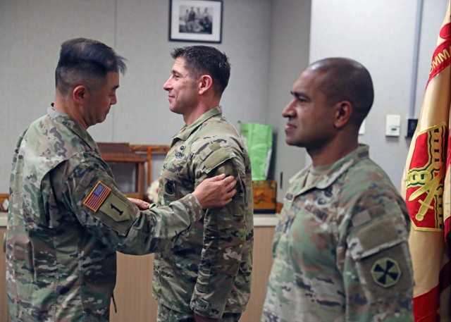 Army garrison Soldiers in Korea don Eighth Army patches
