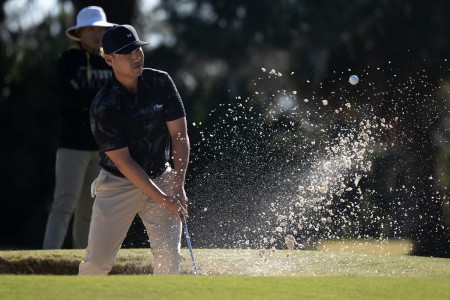 Army Capt. Peter Kim hits out of the sand trap on the 18th hole of The Legends Golf Course at Parris during the final round of the 2025 Armed Forces Golf Championship at Marine Corps Recruit Depot, Parris Island, S.C., Feb. 28, 2025. Kim won the men's division. (DoD photo by EJ Hersom)