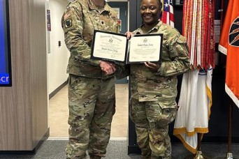Staff Sergeant Wynn was celebrated by the 7th Signal Command during her Army re-enlistment, showcasing her dedication and commitment