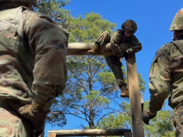 U.S. Army Aviation Center of Excellence Best Squad/Best Warrior competitors experience the 7th Special Forces Group's obstacle course at Eglin Air Force Base, Fla., testing their physical strength, perseverance, and mental fortitude while...