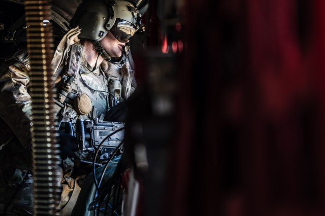 U.S. Army Cpl. Colt Rodgers, a crew chief with the 1st Battalion, 214th Aviation Regiment, 12th Combat Aviation Brigade conducts CH-47F Chinook gunnery tables at the Grafenwoehr Training Area, Germany, on March 3, 2025. This training maximized...