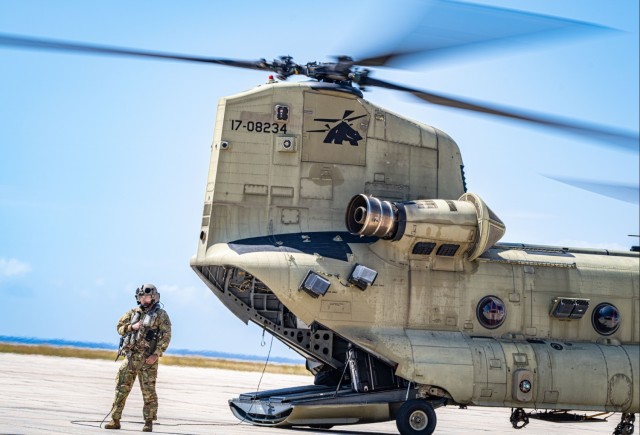 US Army South Soldiers make a soaring commitment by reenlisting over Guantanamo Bay