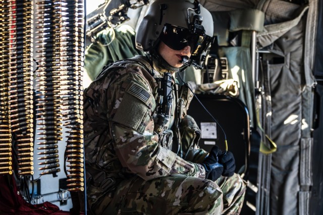 U.S. Army Capt. David Bindon, a pilot with the 1st Battalion, 214th Aviation Regiment, 12th Combat Aviation Brigade waits to conduct gunnery tables in a CH-47F Chinook at the Grafenwoehr Training Area, Germany, on March 3, 2025. This training...