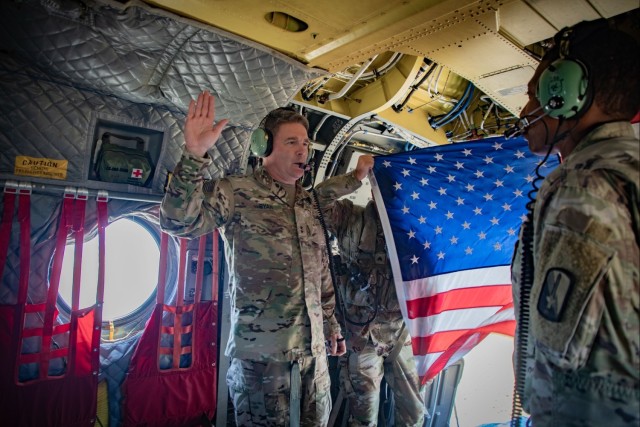 US Army South Soldiers make a soaring commitment by reenlisting over Guantanamo Bay
