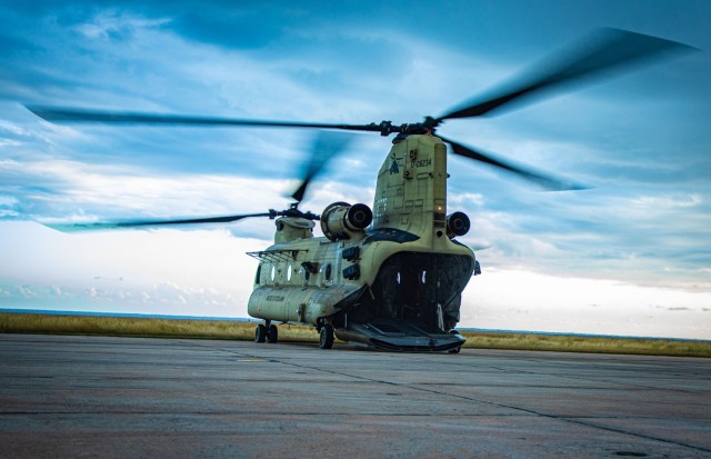 US Army South Soldiers make a soaring commitment by reenlisting over Guantanamo Bay