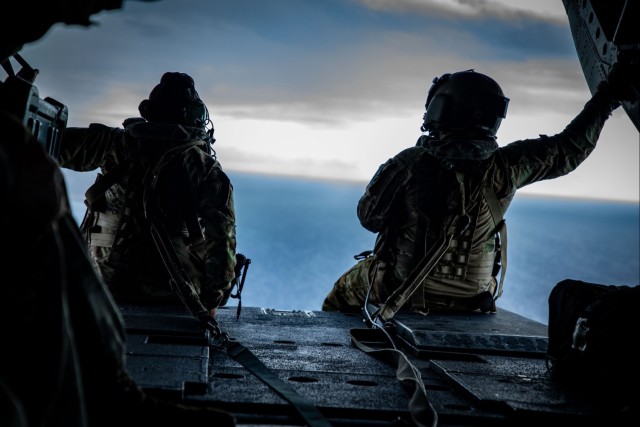 US Army South Soldiers make a soaring commitment by reenlisting over Guantanamo Bay