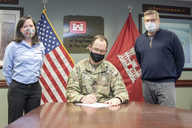 Col. Karl Jansen (middle), St. Paul District commander, signs a project partnership agreements with Prairie Island Indian Community, Feb. 24, 2021.