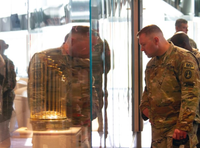 Sgt. 1st Class Jared Martin, Detachment Sergeant for the Fort Belvoir Law Enforcement Activity admires a trophy case inside one of the Nationals Park club areas.