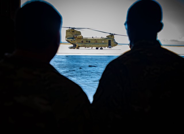 US Army South Soldiers make a soaring commitment by reenlisting over Guantanamo Bay