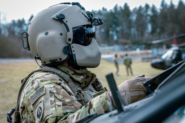 U.S. Army Sgt. 1st Class Cody Spangler, platoon sergeant with the 1st Battalion, 214th Aviation Regiment, 12th Combat Aviation Brigade performs pre-combat checks on a UH-60V Blackhawk prior to completing gunnery tables at the Grafenwoehr Training...
