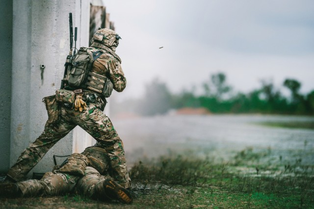 A Ranger with the 75th Ranger Regiment pulls security during movement to contact at a live fire exercise in Fort Johnson, La. on Dec. 1. The 75th Ranger Regiment is the U.S. Army's premier direct action raid force, and trains year around to be...