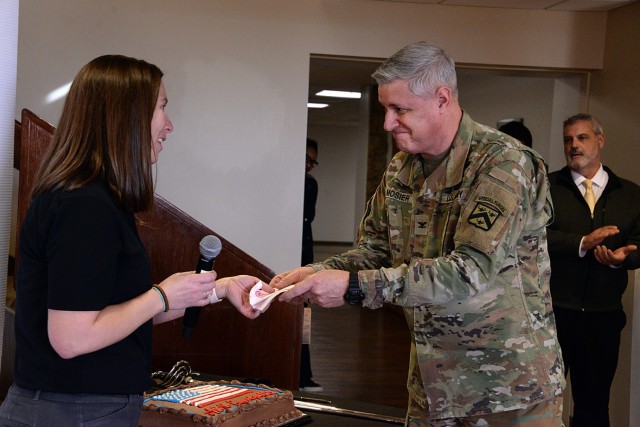 Fort Leavenworth Garrison Commander Col. Duane Mosier turns in his Army Emergency Relief pledge form to AER Officer Reagan Sawyer, Army Community Service manager, during the AER kick-off event March 7, 2025, at the Solarium Buffet at the Frontier...
