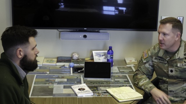 LTC Paul Brownhill and Natural Resources specialist Hunter Young going over their set curriculum during their most recent Mentor-Mentee meeting at Kansas City District Headquarters on Feb. 20.