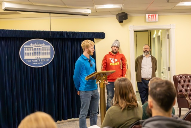 Hydraulic engineer and FY25 LDP participant Micheal Mansfield standing at the podium as President Truman announcing his decision after briefing with his mach cabinet in the crowd at the “End the War with Japan” scenario at the Truman Library...