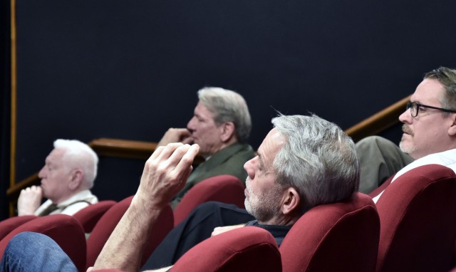 VICENZA, Italy - Jerry Brees, Soldiers’ Theatre director, center, attends a rehearsal of “Radium Girls&#34; March 4, 2025, sitting near some of the cast members....