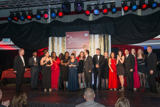 KAISERSLAUTERN, Germany - Jerry Brees, right, and the cast members of &#34;The Wiz&#34; pose for a picture after receiving nine awards at the 2013 IMCOM-Europe Entertainment Tournament of Plays (TOPPERs) Awards April 30, 2013, at the...