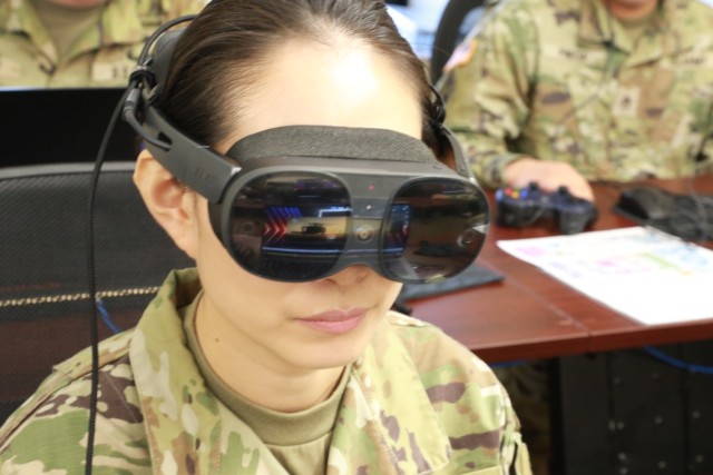 Staff Sgt. Junjun Sun preps for her role as an OC/T by performing the duties in a virtual environment at the First Army OC/T Academy.