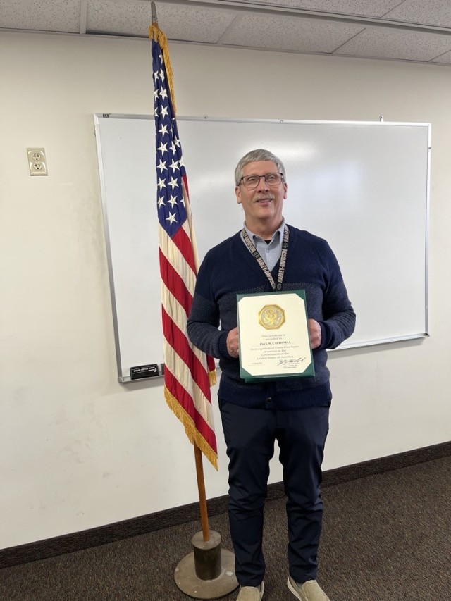 Paul Carbonell honored for 45 years of service by 7th Signal Command (Theater)