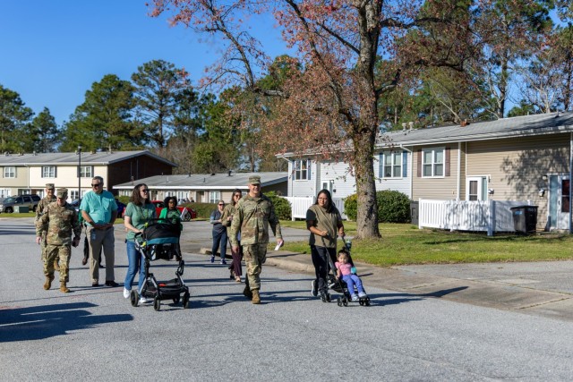 Col. Anthony Kazor and Command Sgt. Maj. Daniel Durette, Fort Eisenhower garrison commander and command sergeant major, lead representatives from Providence Family Homes, the Directorate of Emergency Services, Dwight D. Eisenhower Army Medical...