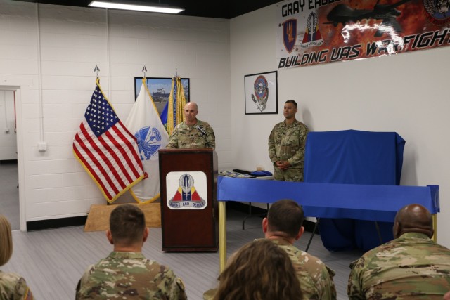 2-13th  Aviation Regiment cuts ribbon on new Gray Eagle Simulator Training Facility