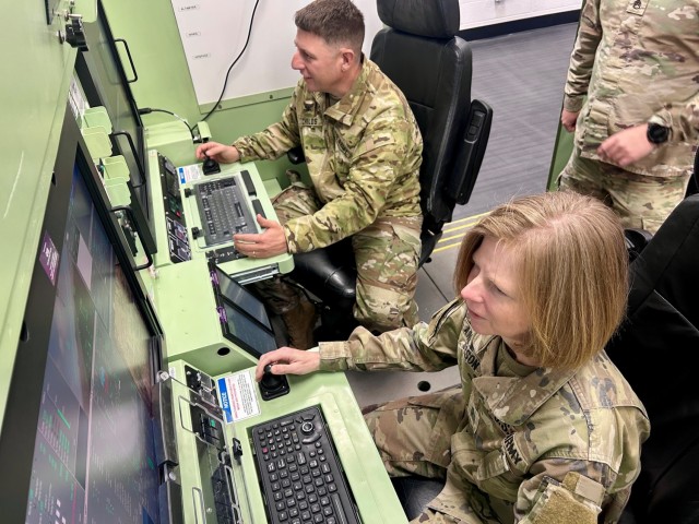 2-13th  Aviation Regiment cuts ribbon on new Gray Eagle Simulator Training Facility