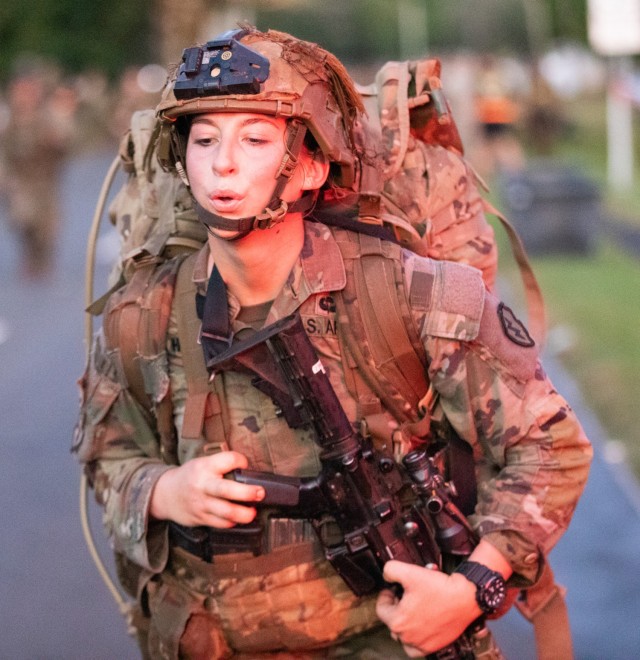 A U.S. Army Soldier assigned to the 25th Infantry Division completes their 12 mile ruck march to successfully obtain one of the Expert Infantry, Expert Soldier, and Expert Field Medical badges, (E3B), on Schofield Barracks, Hawaii, March 14, 2025....
