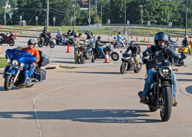 Riders take off from the Main Post Chapel during a Thunder in the Fort safety motorcycle ride in 2023.