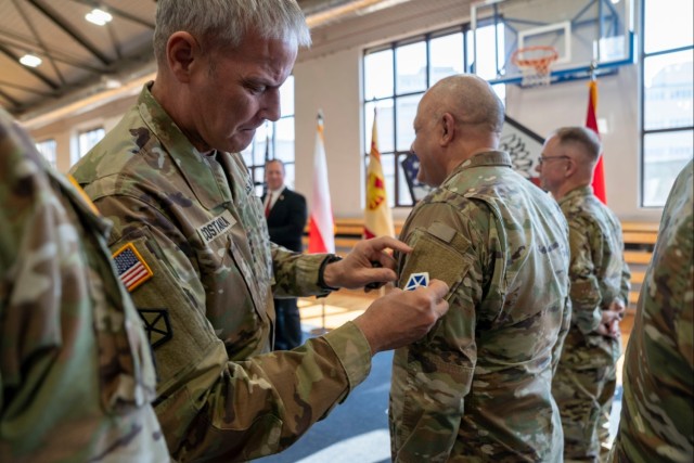 V Corps on the shoulder, USAG Poland celebrates growth during patching ceremony, birthday