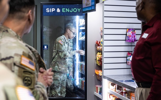 A 1st Theater Sustainment Command Speclialist completes the first purchase on the new 1st TSC barracks mini market at Fort Knox, Kentucky, March 20, 2025. The market was installed on the 13th and a ribbon cutting ceremony was held the following...