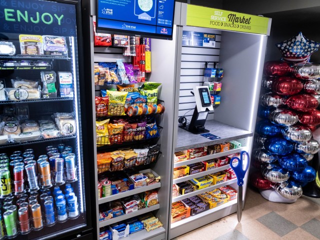 Fort Knox Garrison and Army and Air Force Exchange Services leadership host a ribbon cutting ceremony for the 1st Theater Sustainment Command barracks mini market at Fort Knox, Kentucky, March 20, 2025. This market is the sixth of its kind on the...