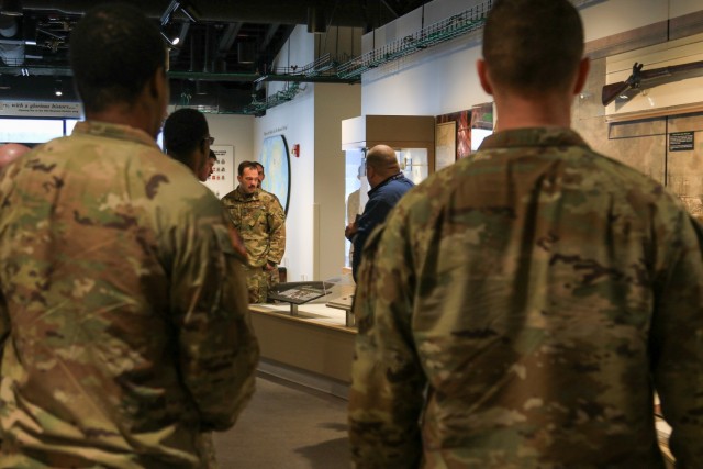 Doug Schmidt, Museum Curator, begins his tour March 14, 2025, at the 10th Mountain Division & Fort Drum Museum. The tour of the museum consisted of the 10th Mountain Division (LI) history and the legacy of the Noncommissioned Officers who helped...