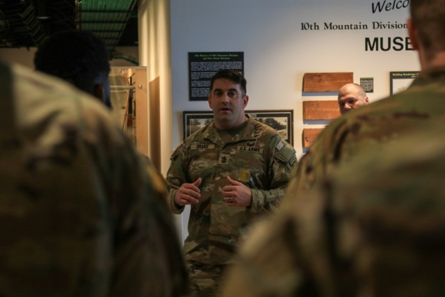 1st Sgt. Anthony Drake, assigned to D Troop, 6th Squadron, 6th Cavalry Regiment, 10th Combat Aviation Brigade, 10th Mountain Division (LI), briefs his Soldiers, March 14, 2025, at the 10th Mountain Division & Fort Drum Museum. Drake spoke to his...