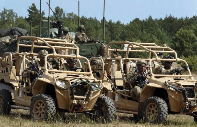 Paratroopers escort dozens of stryker vehicles during operation Swift Response in Torun Poland, June 8th 2016....