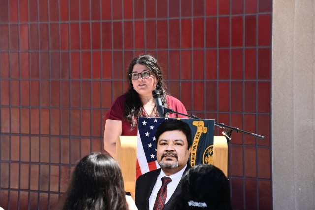Elizabeth Johnson, niece of the late U.S. Army Yuma Proving Ground (YPG) Technical Director Larry Bracamonte, speaks at the dedication ceremony renaming YPG&#39;s headquarters building in his honor on March 24, 2025....