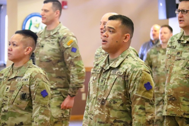 A scene from a patching ceremony held March 13, 2025, is shown in building 905 at Fort McCoy, Wis. Soldiers with U.S. Army Garrison-Fort McCoy traded out the Army Materiel Command patches on their uniforms for the blue clover patch of the 88th...