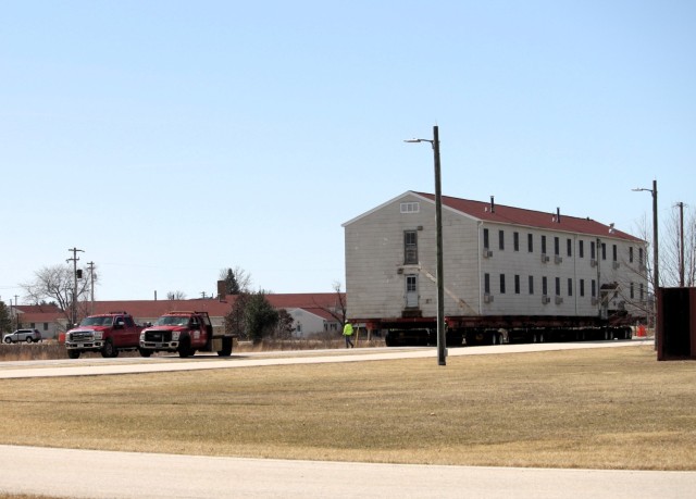 Contractors take advantage of good weather; successfully move third of five World War II-era barracks at Fort McCoy